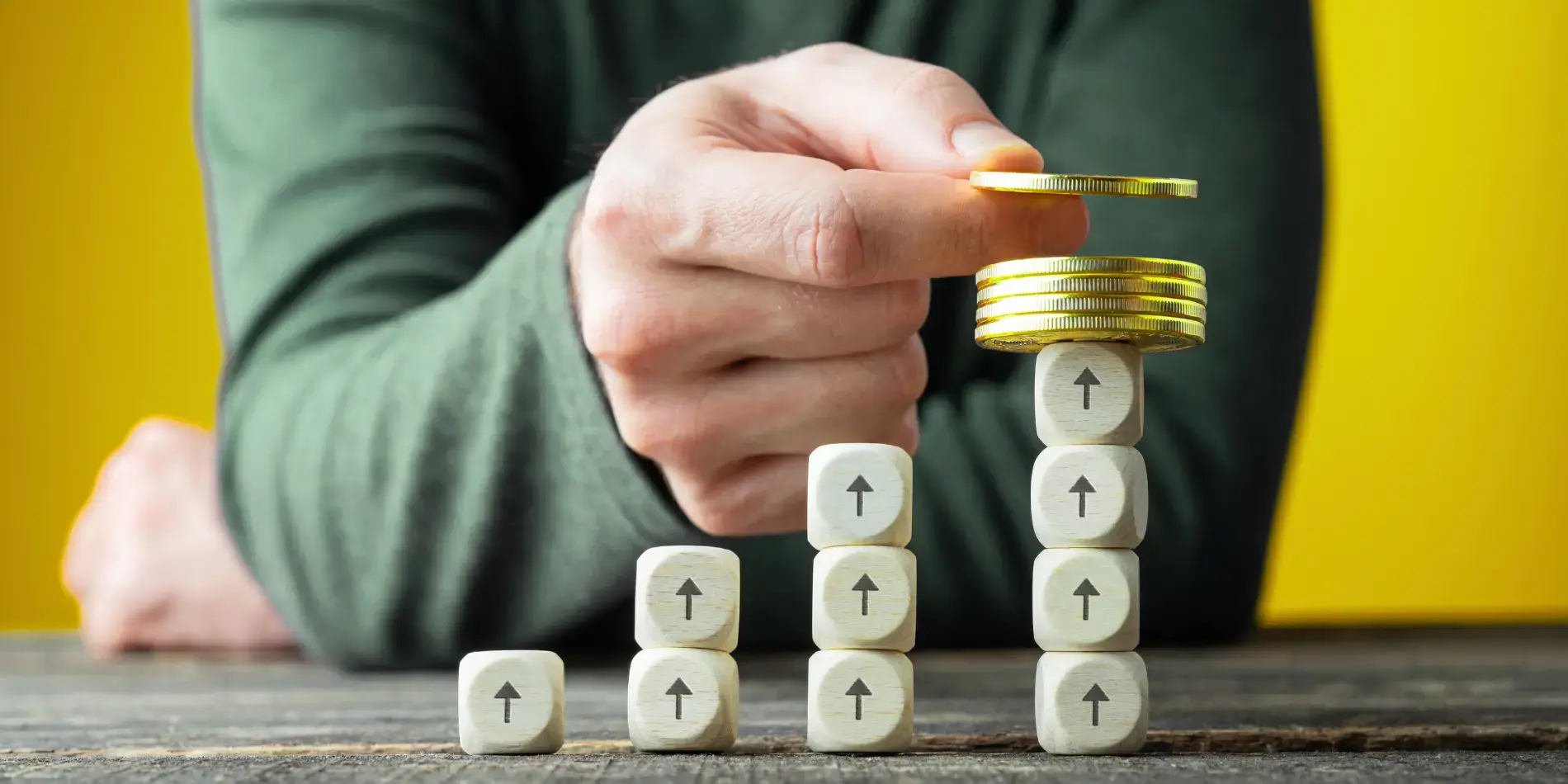 stacking coins on top of up arrow dice